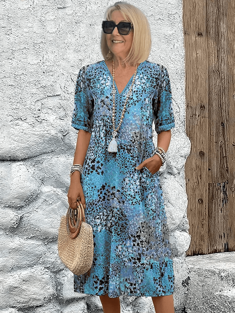 Elaisa | Elegantna Midi Cvetlična Obleka